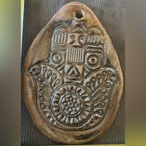 Hand made wall hanging ceramic Hamsa.